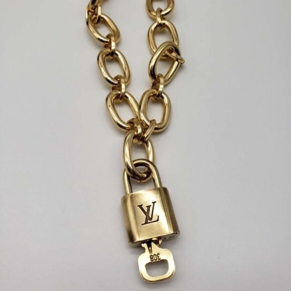 Authentic Louis Vuitton Lock and Key Gold w/Unbranded Geometry Cuban Style Chain
